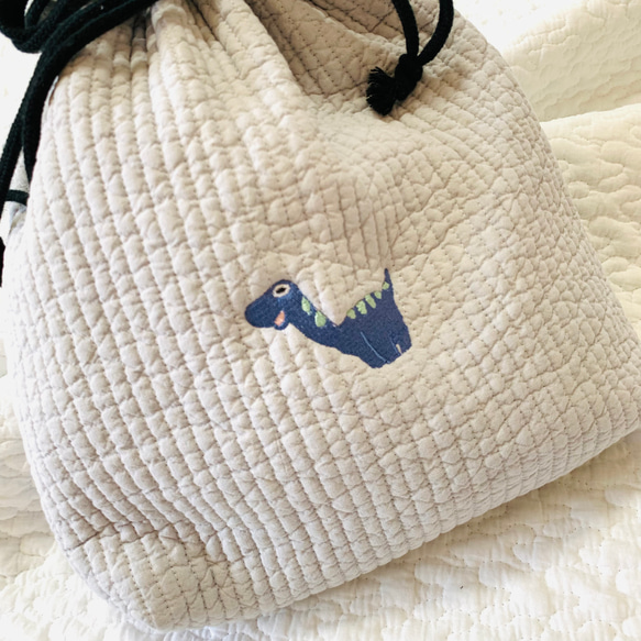 Sサイズ　おとぼけだいなそー　nubiが選べる お着替え巾着　ヌビポーチ　お着替え　おむつポーチ　恐竜刺繍　オリジナル 5枚目の画像