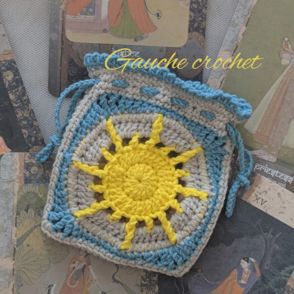 太陽モチーフの巾着ポーチ / the sun タロット 神秘的 19 かぎ編み