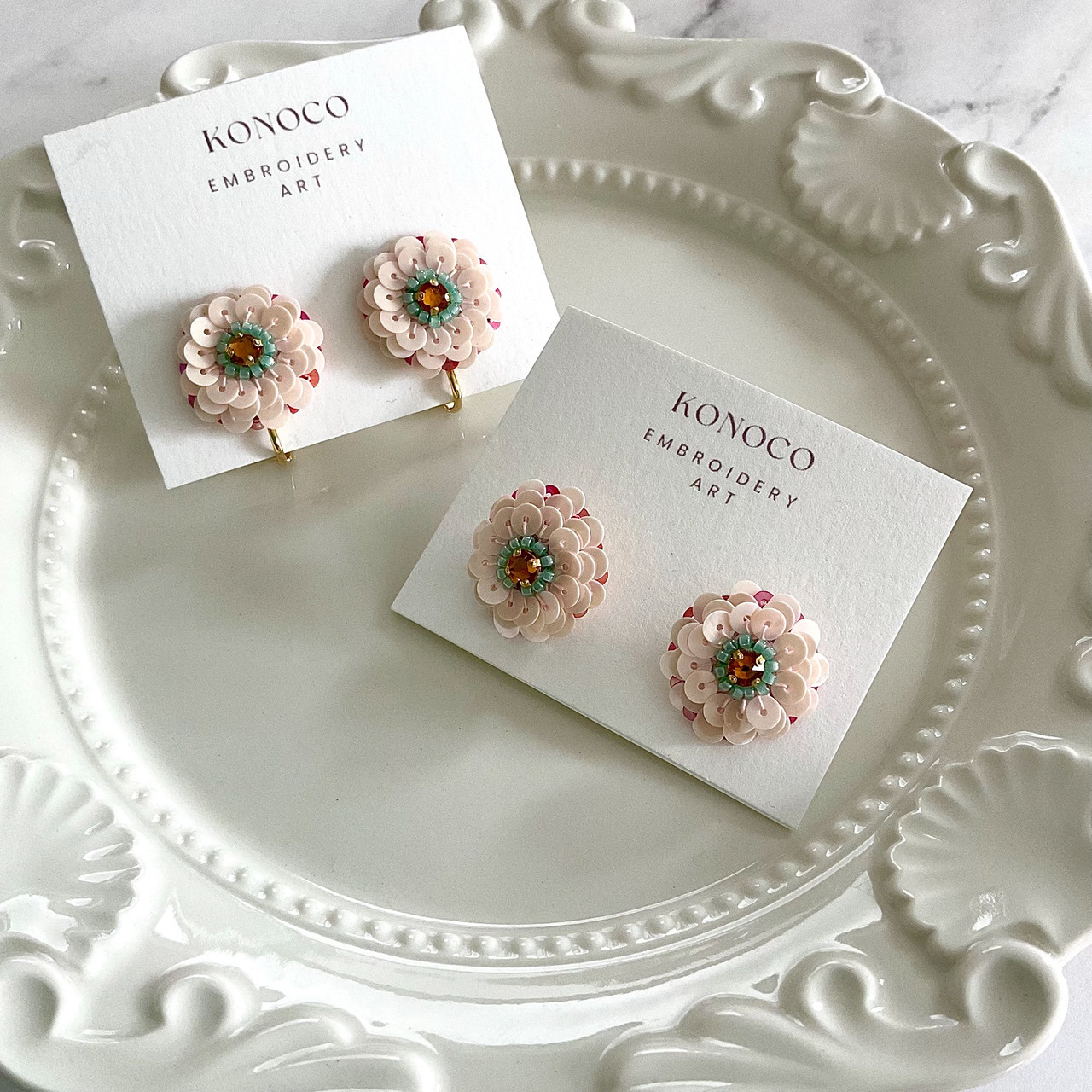 トケイソウの耳飾り(ミルキーピンク×トパーズ)