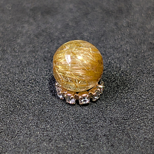 ギラギラ輝くキャッツアイルチル クォーツ 8ミリ 1粒売り 金銭運を呼ぶ