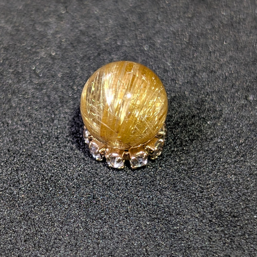 ギラギラ輝くキャッツアイルチル クォーツ 8ミリ 1粒売り 金銭運を呼ぶ