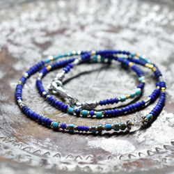 ボタニカルなカレンシルバーと翡翠色アンティークビーズのネックレス