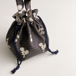 再販【ラスト1点のみ】持ち物によって形が変えらえる2way巾着