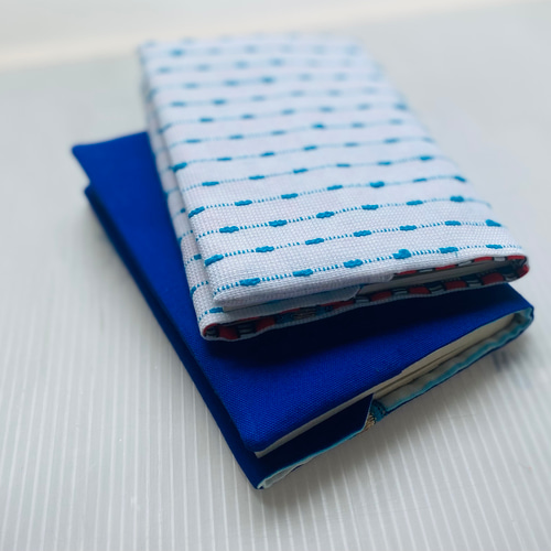 ゆぴ ブックカバー omou kyujitsu ブックカバー | uwaru