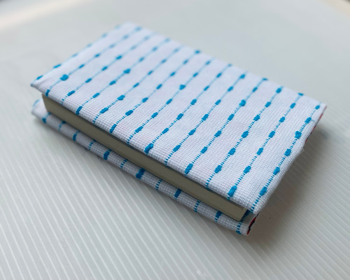 ゆぴ ブックカバー omou kyujitsu ブックカバー | uwaru