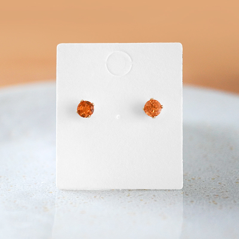 スペサルタイトガーネットのスタッドピアス（4mm）4本爪 14kgf