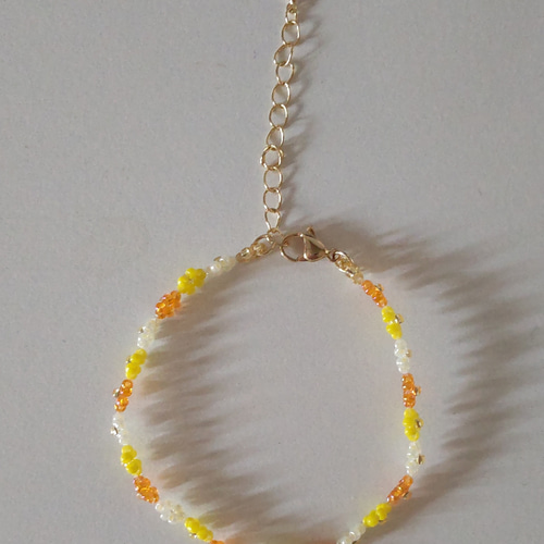 ビーズブレスレット 花 オレンジ×イエロー×ゴールド 韓国アクセサリー