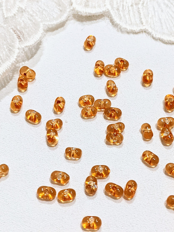 ファルファーレ オレンジ 2✕4㍉ 5g ピーナッツ ビーズ パール ガラス つぶつぶ パーツ 1枚目の画像