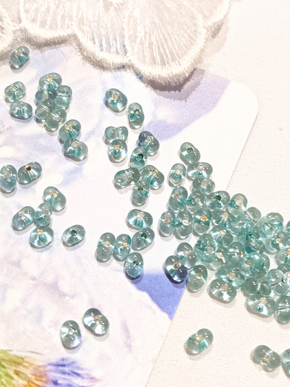 ファルファーレ ターコイズブルー 2✕4㍉ 5g ピーナッツ ビーズ パール ガラス つぶつぶ パーツ 1枚目の画像