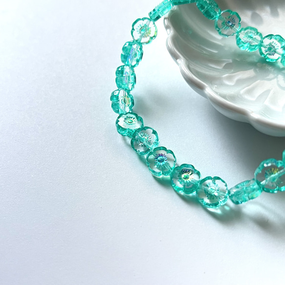 【4個】チェコガラスビーズ＊フラワー＊クリア×ターコイズグリーン 1枚目の画像