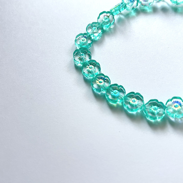 【4個】チェコガラスビーズ＊フラワー＊クリア×ターコイズグリーン 2枚目の画像