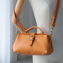 【特價促銷 - 略有瑕疵】超人氣！橫扣包 - 享38%折扣！ 第17張的照片