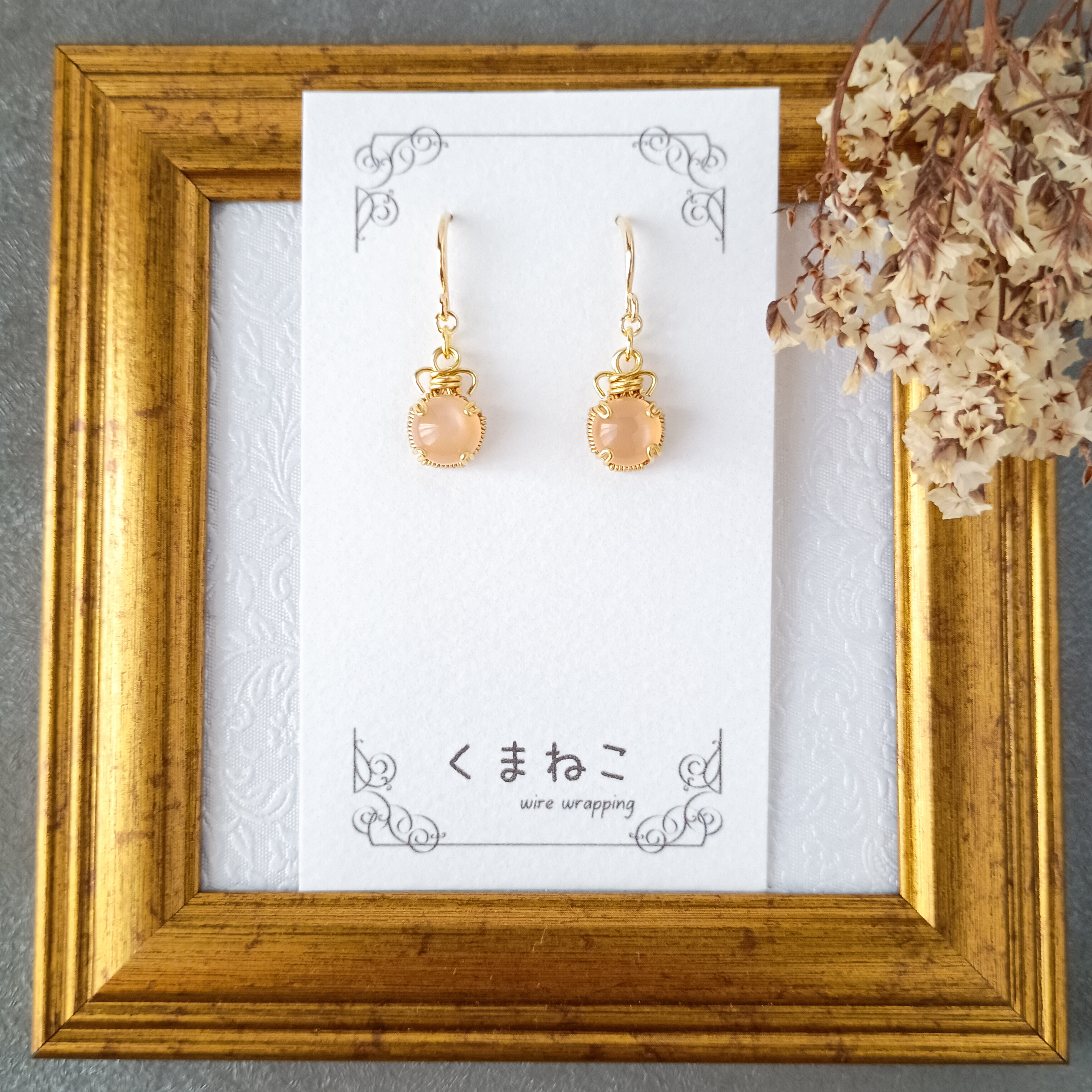 イヤリング可✡6月誕生石オレンジムーンストーン1粒フックピアス✡ワイヤーラッピング