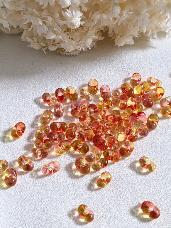 ファルファーレ オレンジ 3.2✕6.5㍉ 5g ピーナッツ ビーズ チェコ 通し穴 透明 ガラス つぶつぶ パーツ 2枚目の画像