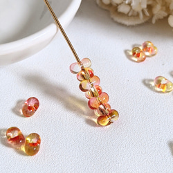 ファルファーレ オレンジ 3.2✕6.5㍉ 5g ピーナッツ ビーズ チェコ 通し穴 透明 ガラス つぶつぶ パーツ 4枚目の画像