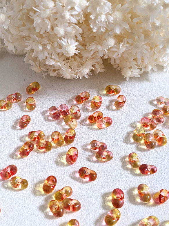 ファルファーレ オレンジ 3.2✕6.5㍉ 5g ピーナッツ ビーズ チェコ 通し穴 透明 ガラス つぶつぶ パーツ 1枚目の画像