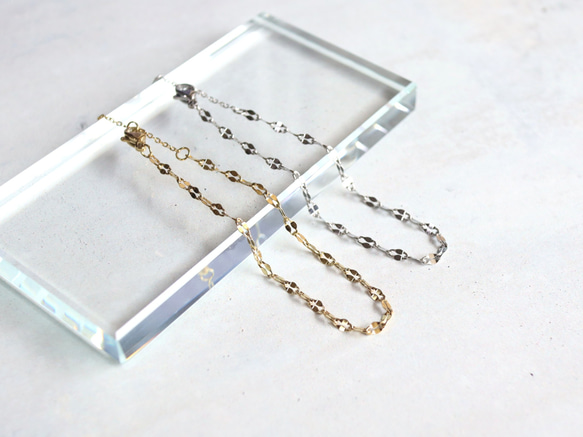 ☆新作☆煌めく ペタルチェーンブレスレット つけっぱなしOK 錆びないサージカルステンレス【gold & silver】 1枚目の画像