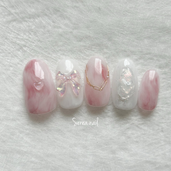 ニュアンスネイルチップチップ[クリアハート.リボン] 1枚目の画像