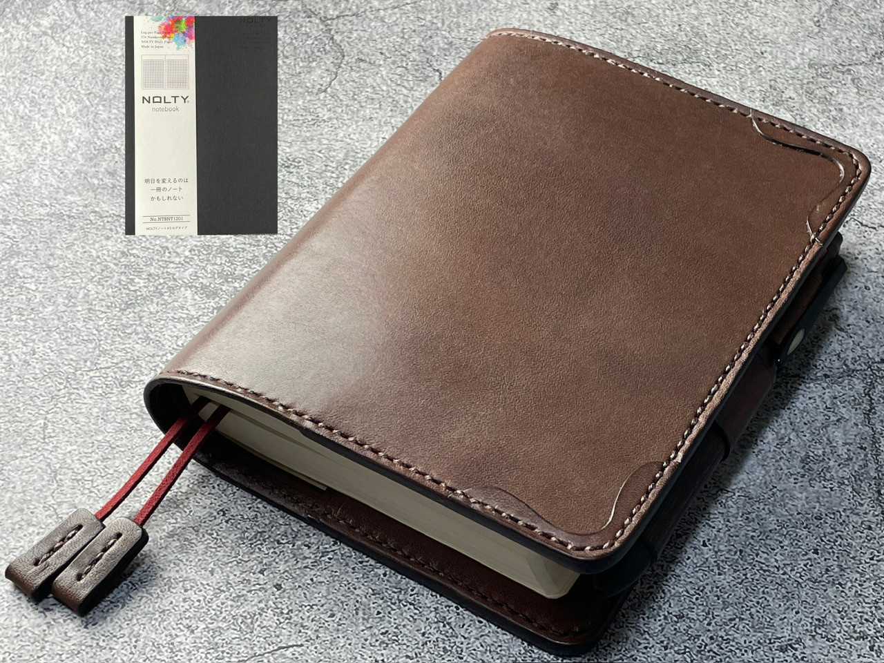 【手縫】NOLTYノートA5 NTBNT1201用キャメル本革手帳カバー（角花飾）2本しおり付き（バタフライストッパー）