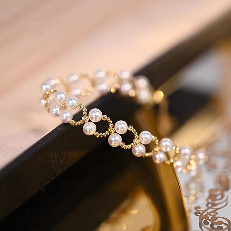 [ヘイズジュエリー] ドリームデザイン 18Kゴールド編み込みシェイプ まばゆいオーロラカラー 4.5-5mm 淡水パールブレス