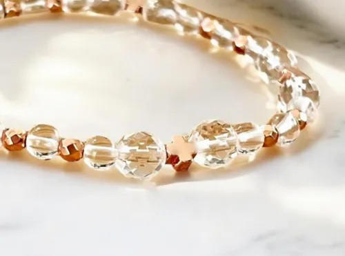 【送料無料】伊勢神宮ご祈祷水晶さんとピンクゴールドカラーにラッピングされたヘマタイトさんのブレスレット