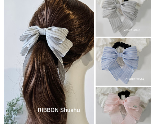 シュシュ  ヘアゴム  クリアブルー 7c9999cd67ba4674a61ed4d64a4d52