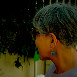 鬼灯レジンの耳飾り（淡いメロンソーダカラー） 6枚目の画像