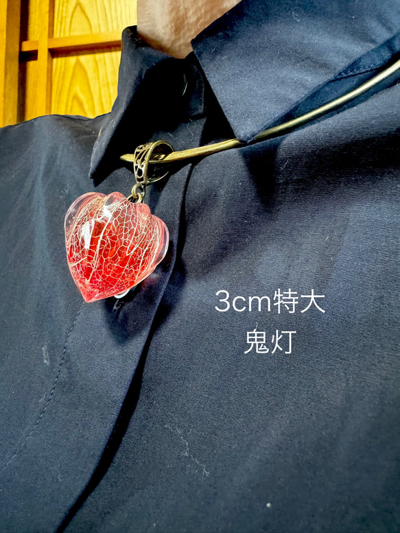 鬼灯レジンの耳飾り（淡いメロンソーダカラー） 19枚目の画像