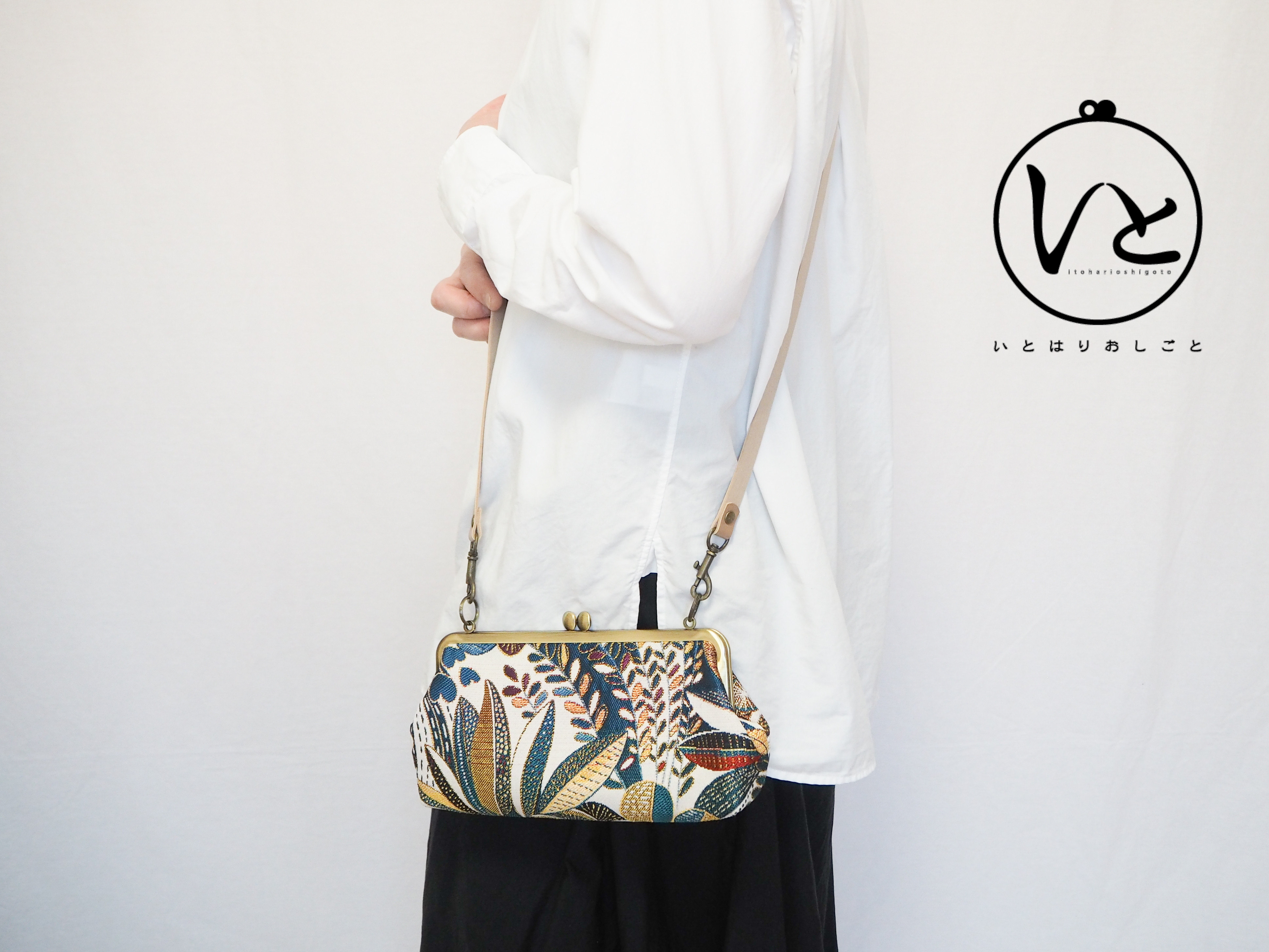 スマホも収納　がまぐちお財布ポーチ≪ピーコックグリーンジャガード≫