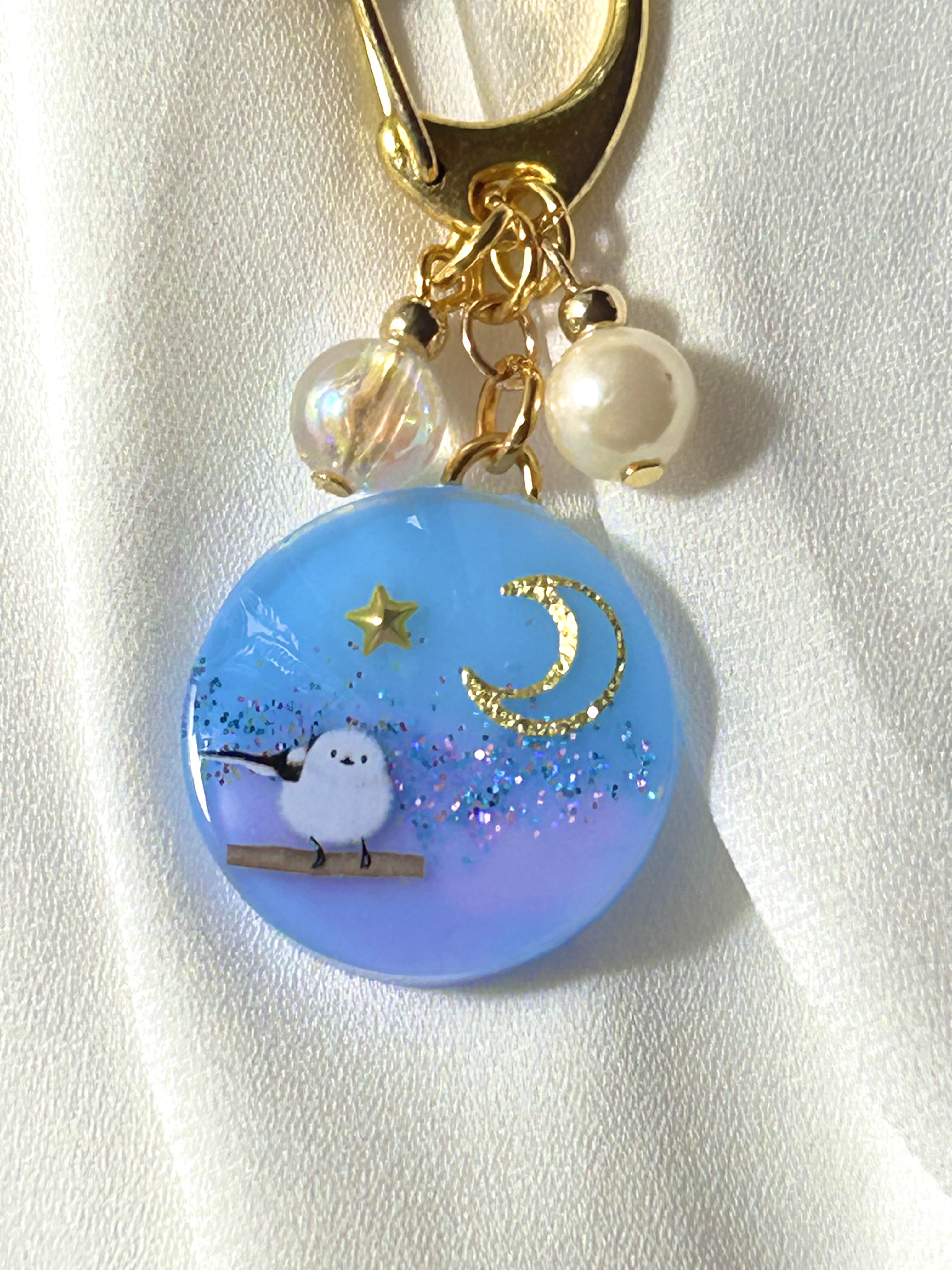 レジンネックレス✩⃛清澄シマエナガ＊蓄光 レジンネックレス✩⃛清澄シマエナガ＊蓄光 レジン/雪の街並みと