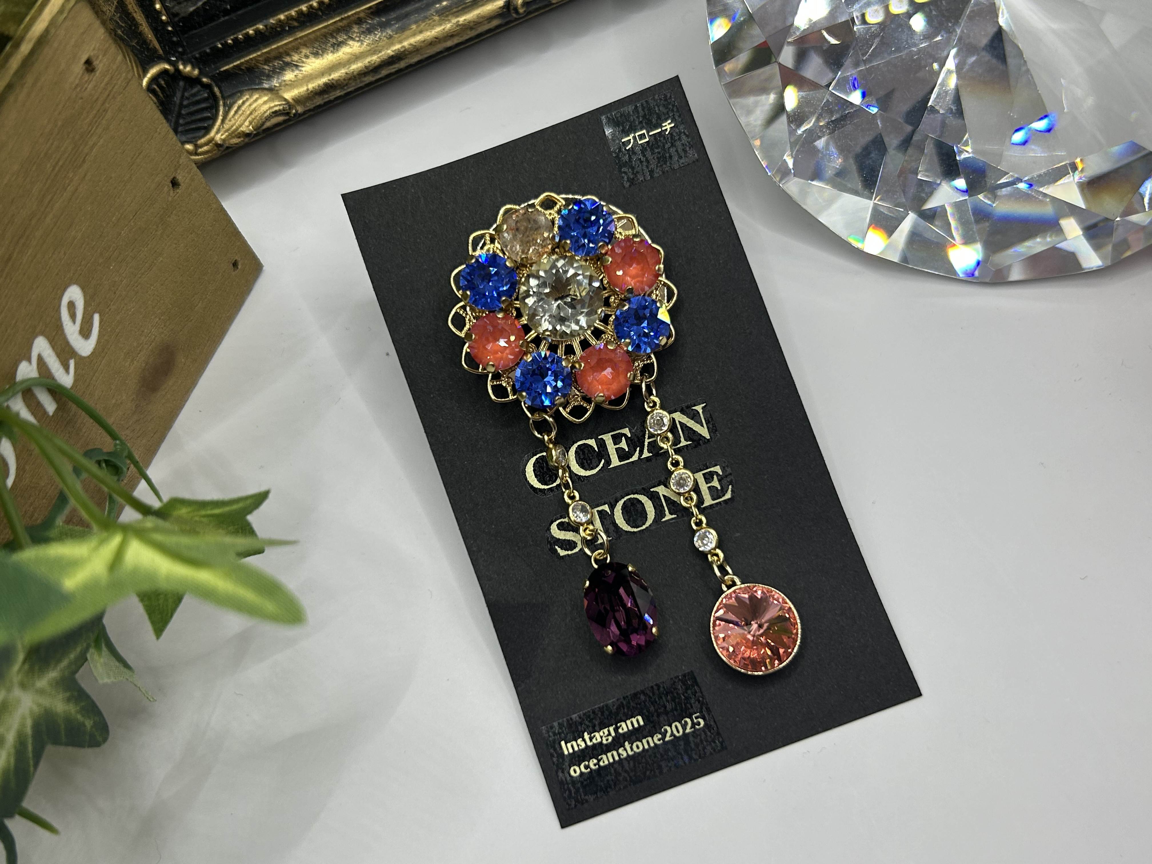 ブルー✖️オレンジフラワーブローチ（ゴールド）OCEAN STONE