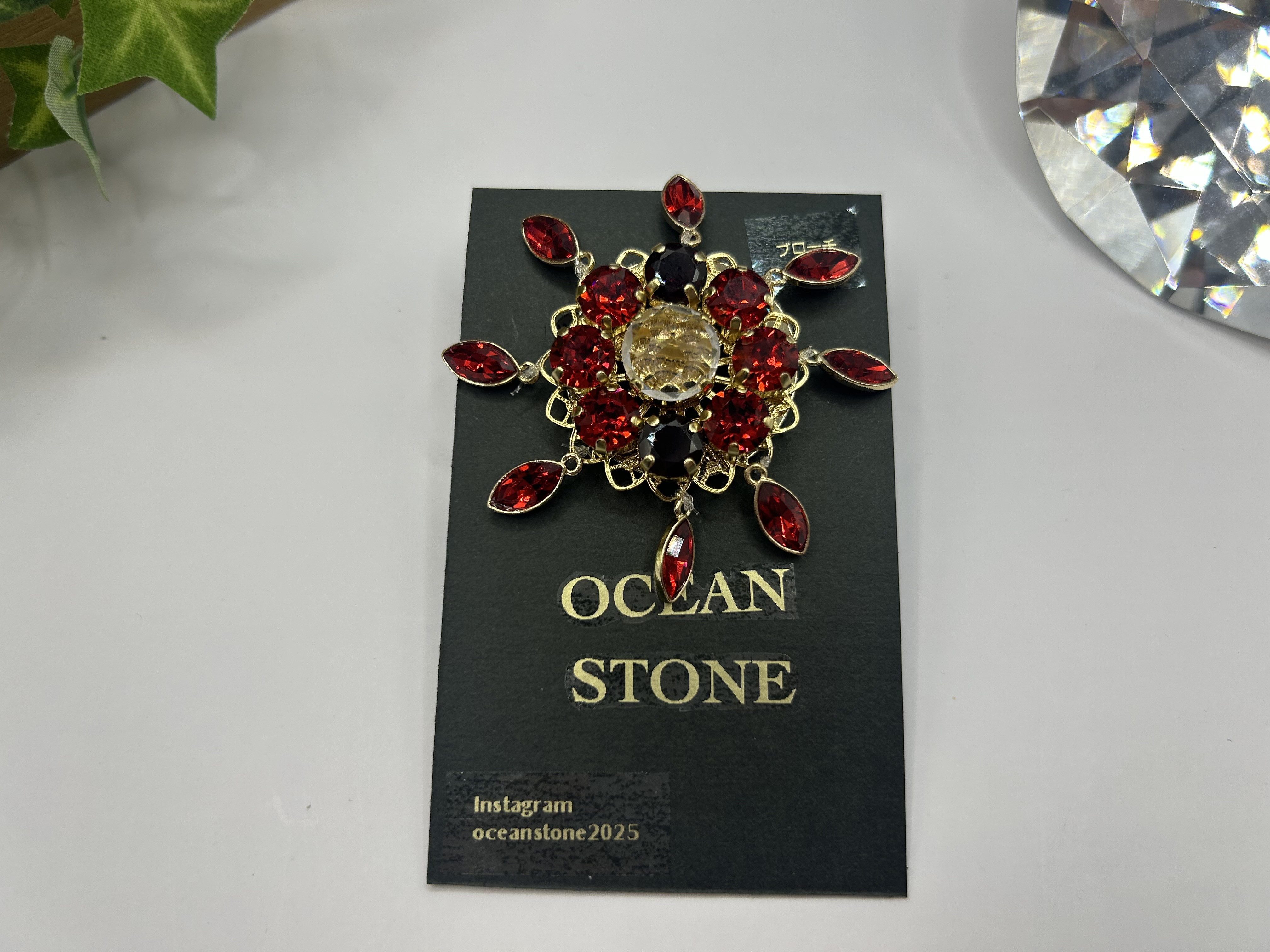 紅い太陽のブローチ（ゴールド）OCEAN STONE