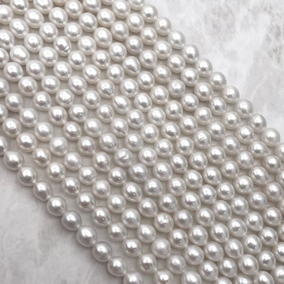 淡水パール 真珠 雫 6mm 5mm 小粒 セミラウンド ライス しずく バロック ホワイト系 連20cm tp0038 1枚目の画像