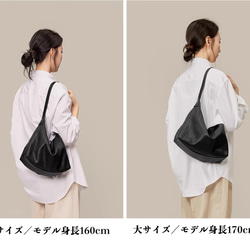 一款具有東方美學風格的雙肩真皮單肩包 | 水染真皮材質，配有可調式肩帶 第12張的照片