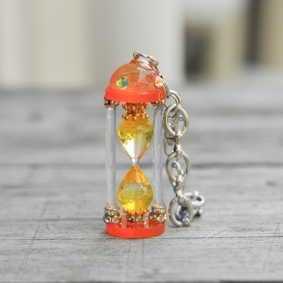ロボット　砂時計 ロボ砂時計バッグチャーム(クリア×オレンジ) その他アクセサリー