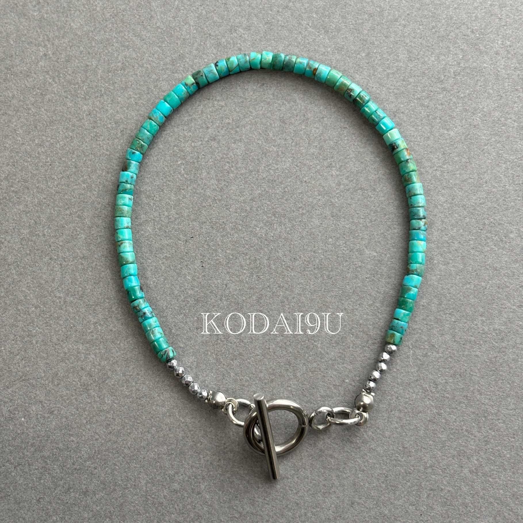 【天然石】フーベイターコイズチューブ型のステンレスブレスレット