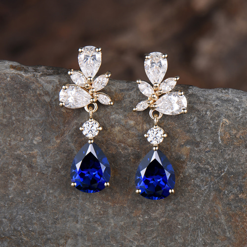 ユニークな9月の誕生石ブルーサファイアピアス モアッサナイト