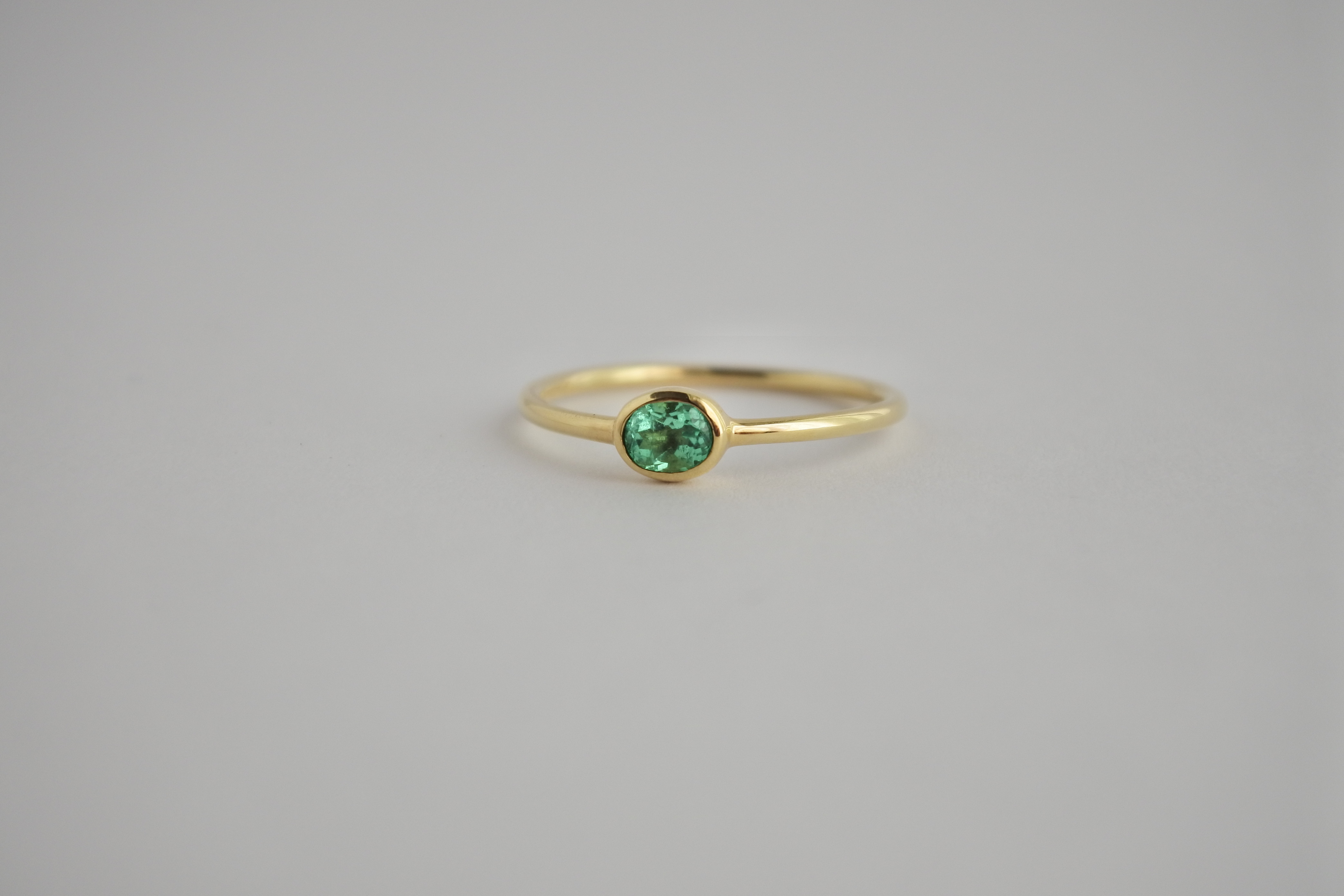 【K18 イエローゴールド×天然エメラルド リング】