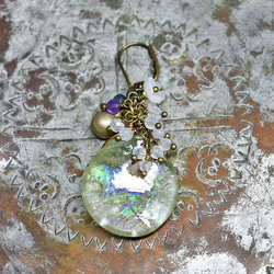 ボタニカルなカレンシルバーと翡翠色アンティークビーズのネックレス