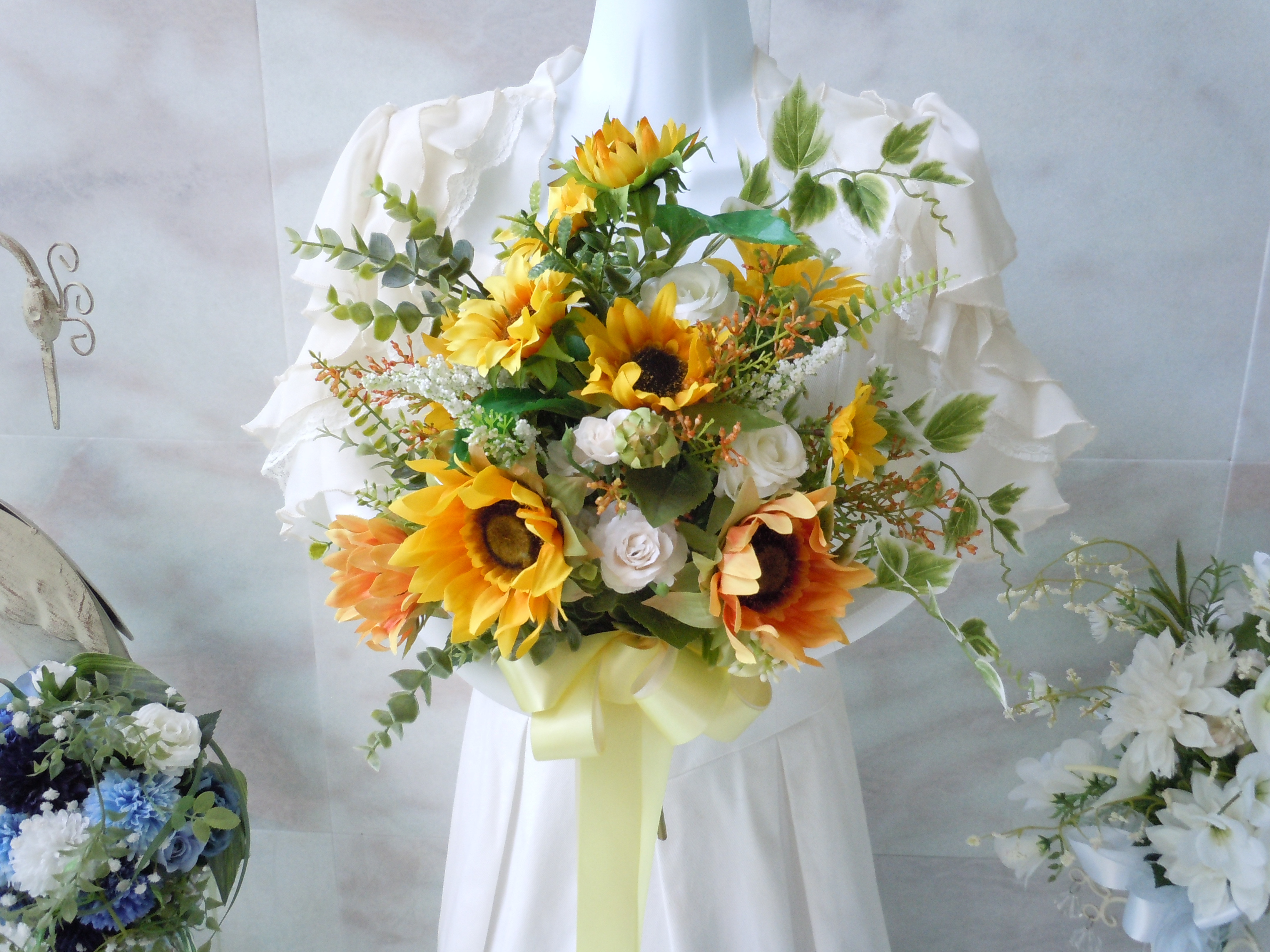 ◆ひまわりとユーカリのクラッチブーケ◆ウエディングブーケ 黄色 フォトウエディング アートフラワー イエロー ブーケ