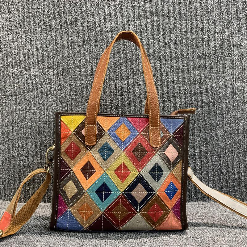 バッグの真髄の上の新品の本革の女性のかばん韓版百相頭層牛皮色女手提単肩小託特包