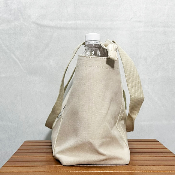 【免運費】A4尺寸相容！帆布拉鍊手提包，背面和口袋處飾有熊貓刺繡 - 可愛時尚，女士必備 第8張的照片