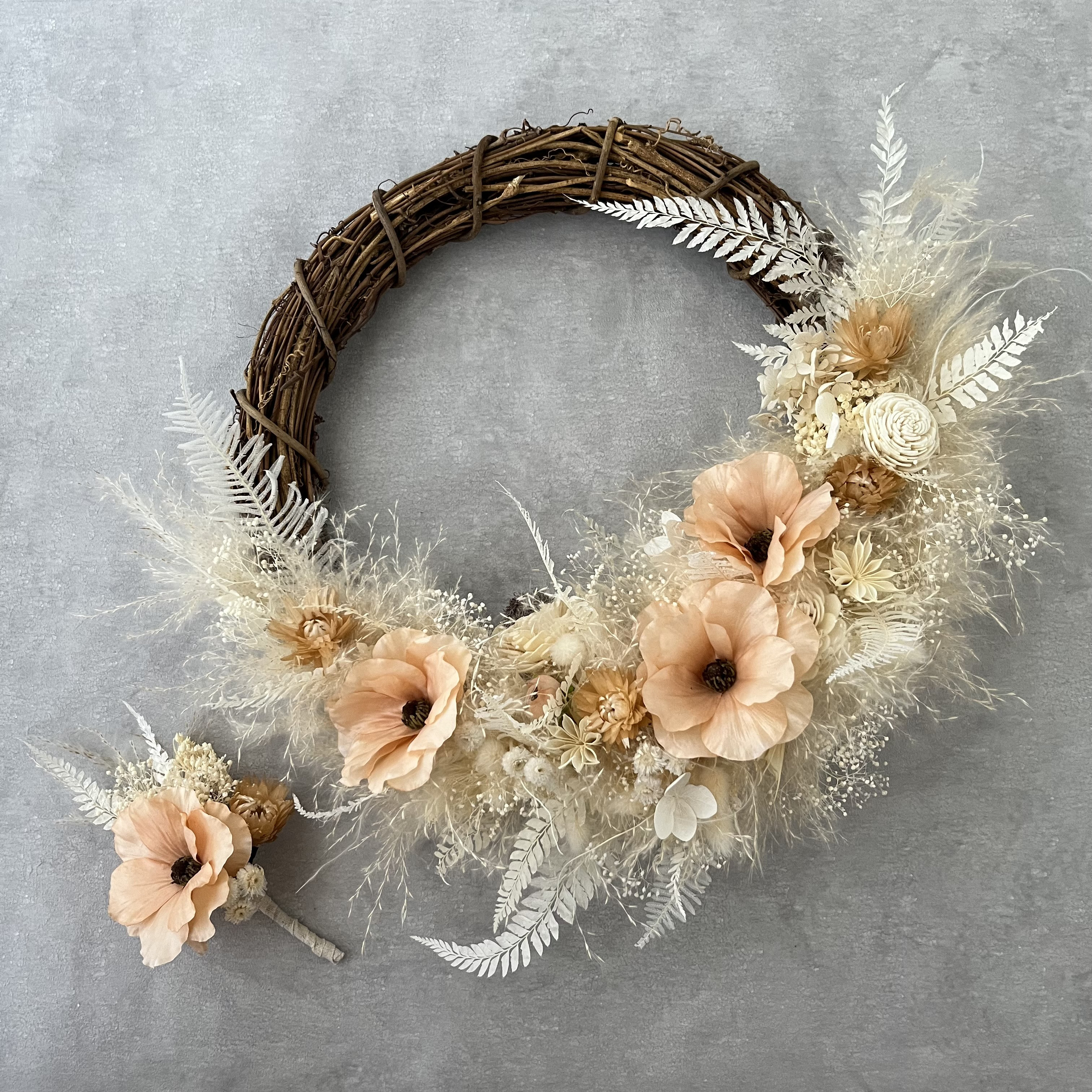 ホワイトオレンジのリースブーケ