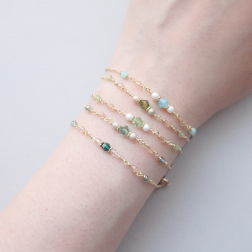 ミルキーグリーン＊ソロバンビーズブレスレット ブレスレット folium