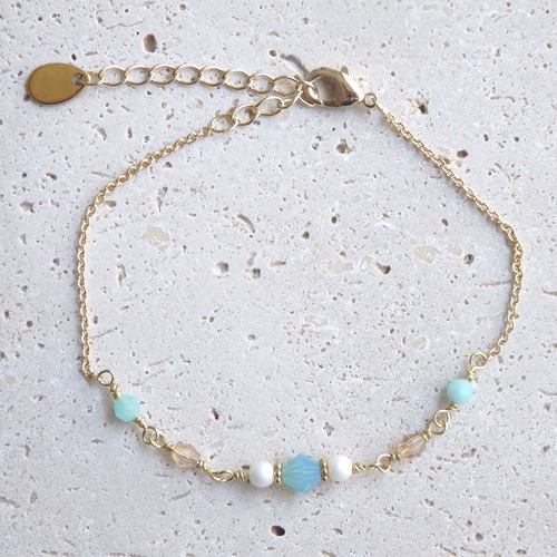 ミルキーグリーン＊ソロバンビーズブレスレット ブレスレット folium