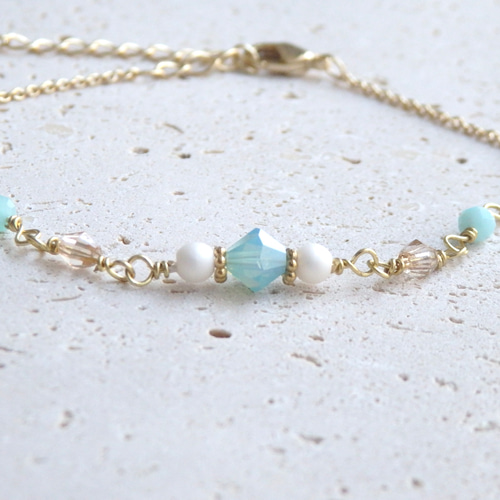 ミルキーグリーン＊ソロバンビーズブレスレット ブレスレット folium