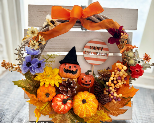 玄関に飾りたいハロウィンゴーストのリース30㎝直径黒の帽子は