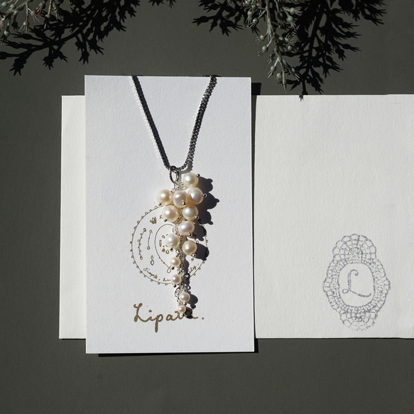 白色紫藤項鍊，淡水珍珠，醫用不鏽鋼，60公分滑軌 - 白色紫藤 第3張的照片