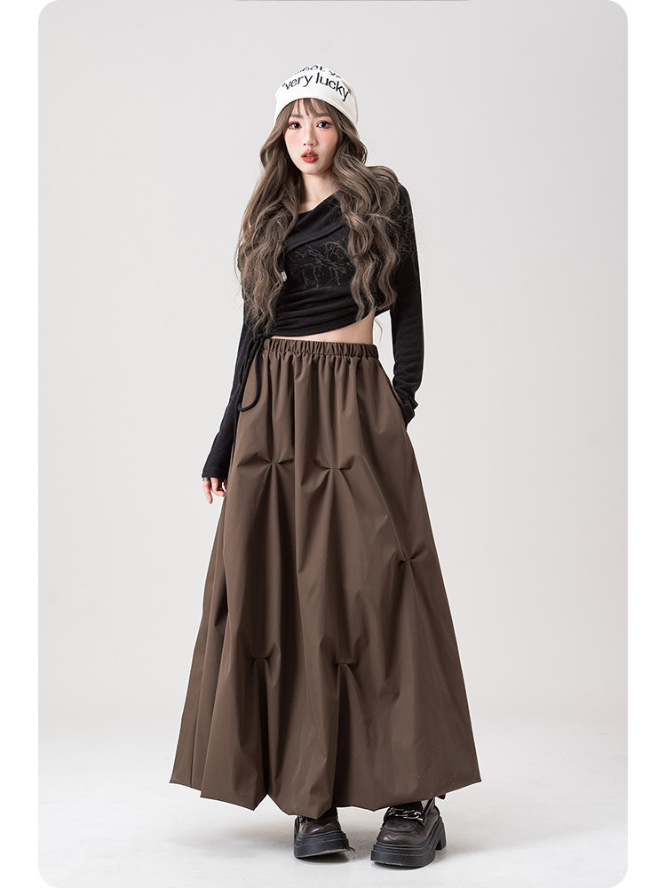 パンツ邦人カレー色プリーツ花蕾半身スカート女2025年春夏新作ハイウエストギャルa字スカートロングスカート