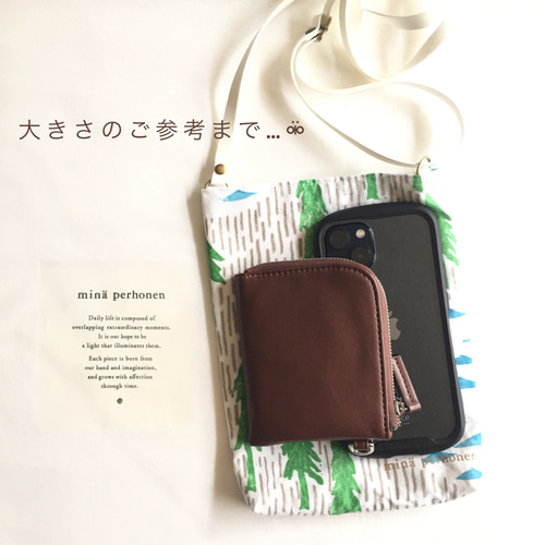 ミナペルホネン 縦型ラウンドショルダーバック 両面 sky flower (b